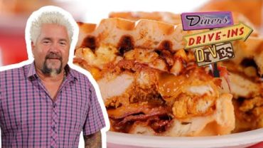 VIDEO: Guy Fieri Eats the Confused Cousin Chicken Sandwich | Diners, Drive-Ins and Dives | Food Network