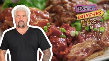 VIDEO: Guy Fieri Eats All-You-Can-Eat Korean BBQ | Diners, Drive-Ins and Dives | Food Network