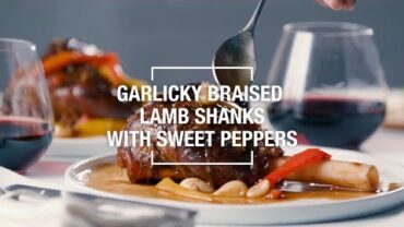 VIDEO: Garlicky Braised Lamb Shanks with Sweet Peppers | Food & Wine