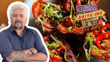 VIDEO: Guy Fieri Eats Pork Dumplings | Diners, Drive-Ins and Dives | Food Network