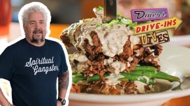 VIDEO: Guy Fieri Eats a Fried Chicken SMASHED Potato | Diners, Drive-Ins and Dives | Food Network