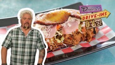VIDEO: Guy Fieri Eats a Patacon Beef Sandwich | Diners, Drive-Ins and Dives | Food Network